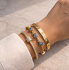 The Ultimate 18k Gold Bracelet Stack | Evil Eye, Classic Cuff & Crystal Roller Combo