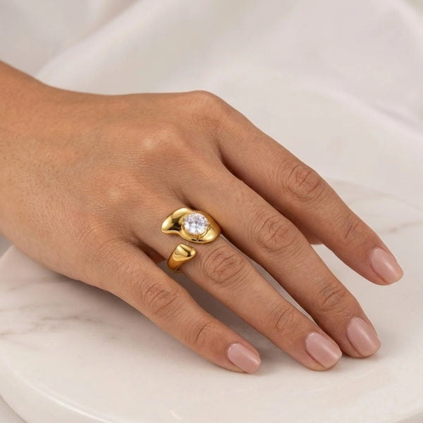 Close up details of sparkling stone in organic shape ring