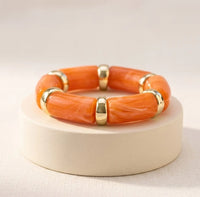 Chunky Orange Resin Bead Bracelet with Metallic Accents | Statement Jewelry
