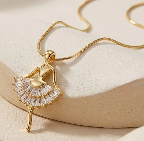 Close up of anti tarnish gold plated ballerina pendant necklace by Moncheri