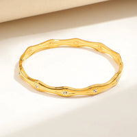 Crystal Studded Wavy Bangle - Anti-Tarnish Gold-Plated Bracelet