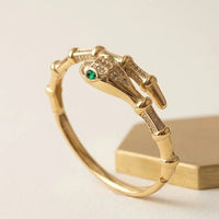 Serpent Wrap Anti-Tarnish Gold Plated Bracelet with Emerald Eyes