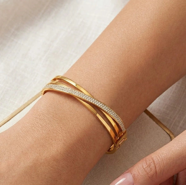 Front view of anti-tarnish gold-plated crossover bracelet with crystals