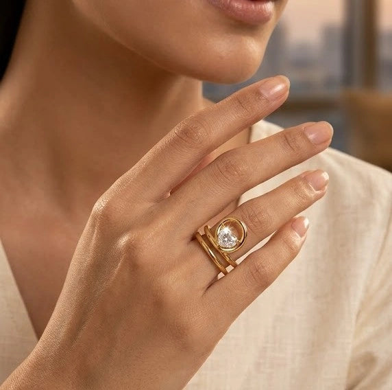 Woman wearing an anti-tarnish spiral solitaire gold plated ring