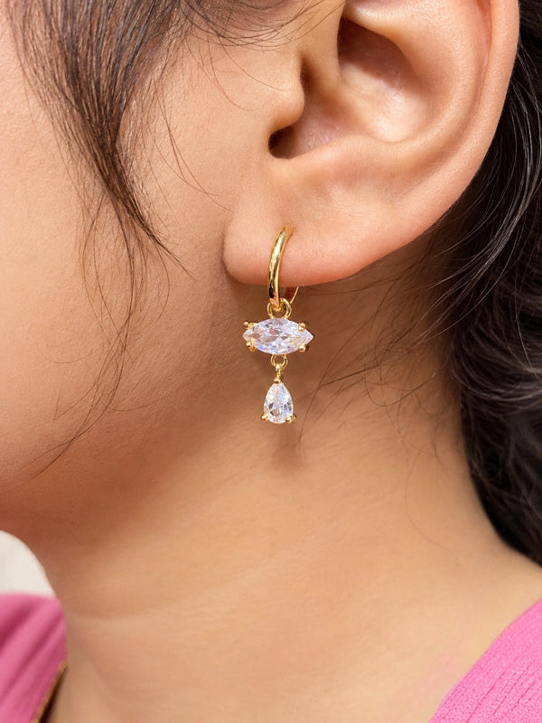 Close up of waterproof and anti tarnish gold plated earrings with sparkling crystal drop