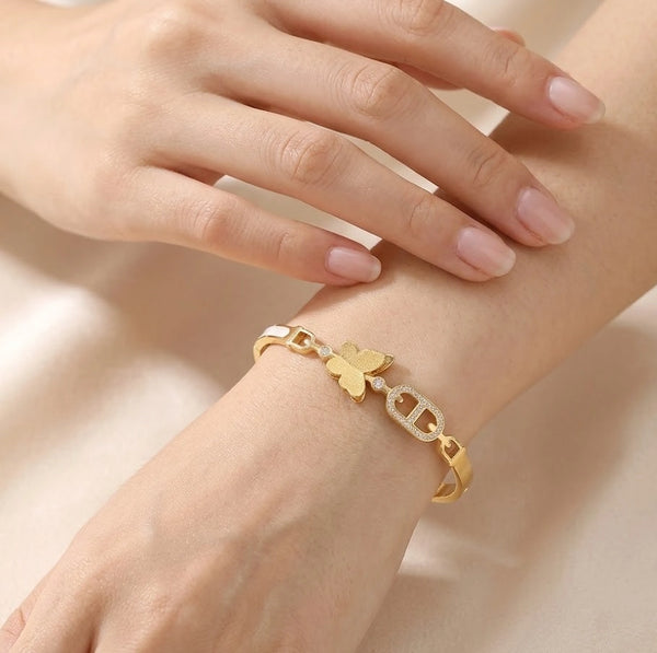 Front view of elegant butterfly charm anti-tarnish gold-plated bracelet