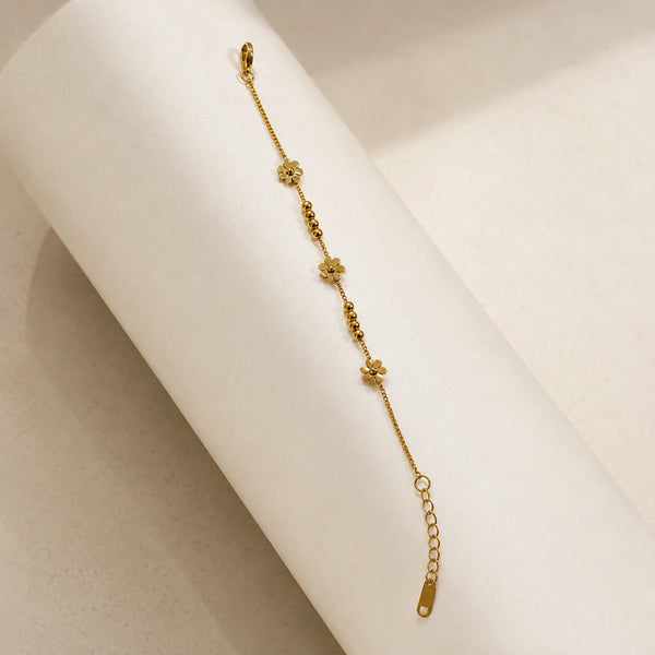 Clean girl cottagecore aesthetic styling with floral gold plated bracelet