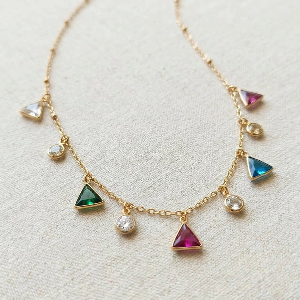 Close up details of pink green blue triangle stones on anti tarnish chain