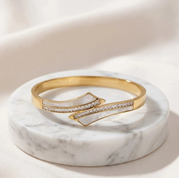 Macro detail of sparkling cubic zirconia stones on anti-tarnish gold-plated bracelet