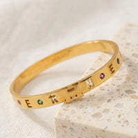Designer Inspired H Letter Cut-Out Anti-Tarnish Gold Plated Bracelet with Multi-Color Stones