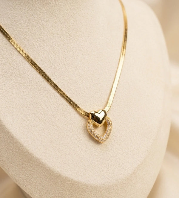 Close Up Detail of Gold Plated Heart Pendant with Sparkling Stones