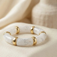 White Marble Pattern Tube Bracelet with Gold Toned Spacers