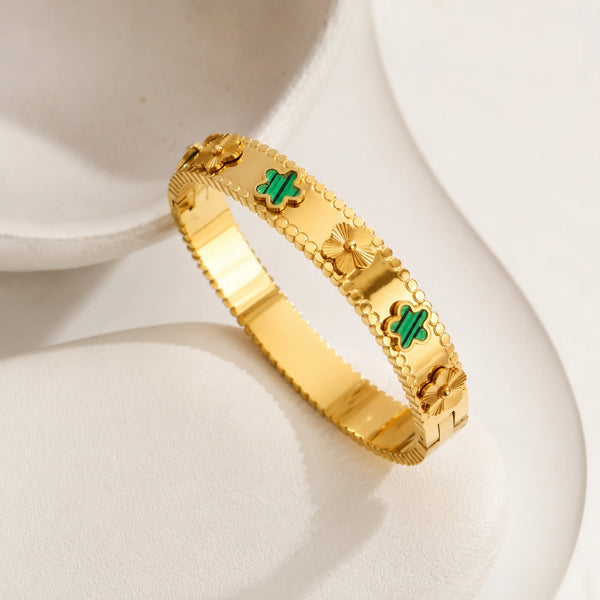 Side angle showing the hinge clasp of the waterproof gold plated bangle