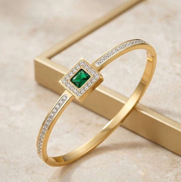 Side angle detail of square halo cuff and sparkling stones