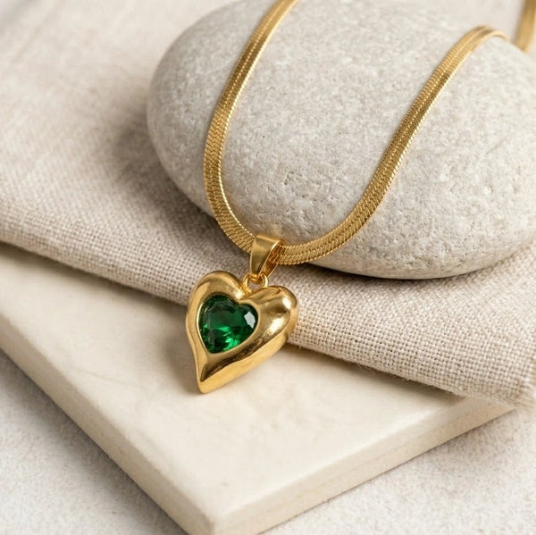 Emerald green heart necklace beautifully displayed as an aesthetic jewelry gift