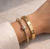 Luxe Gold Bangle Duo: The Slender Split Pavé & Iconic Screw-Motif Stack