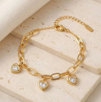 The IT-Girl Gold Plated Bracelet Trio | Heart Charm & Crystal Cuff Stack