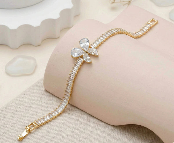 Side angle view of gold plated cubic zirconia bracelet showing secure clasp