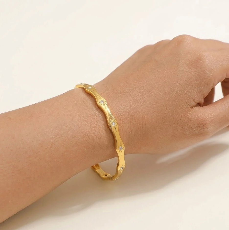 Crystal Studded Wavy Bangle - Anti-Tarnish Gold-Plated Bracelet