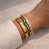 Elite Gold Stack: Emerald Duo & Diamond-Encrusted Stacking Bangles
