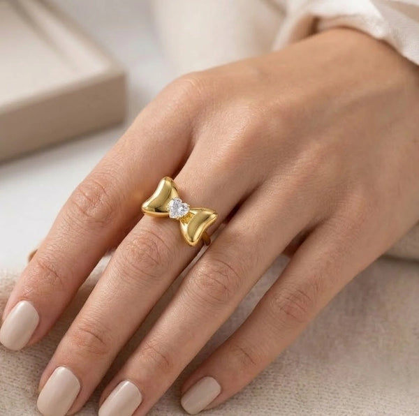 Close up of sparkling heart shaped stone on bow ring