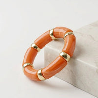 Chunky Orange Resin Bead Bracelet with Metallic Accents | Statement Jewelry