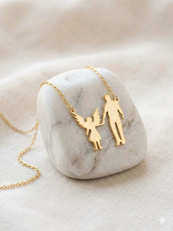 Detailed view of the angel wings on the daughter charm necklace