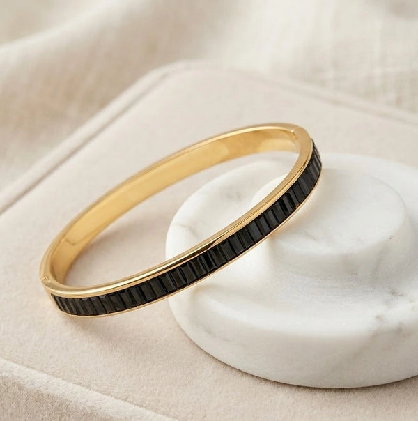 Side view showcasing the slim profile of the anti-tarnish gold-plated cuff bracelet