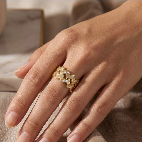 Moncheri premium fashion ring displayed on a light cream background