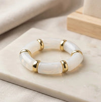 White Marble Pattern Tube Bracelet with Gold Toned Spacers