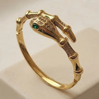 Serpent Wrap Anti-Tarnish Gold Plated Bracelet with Emerald Eyes