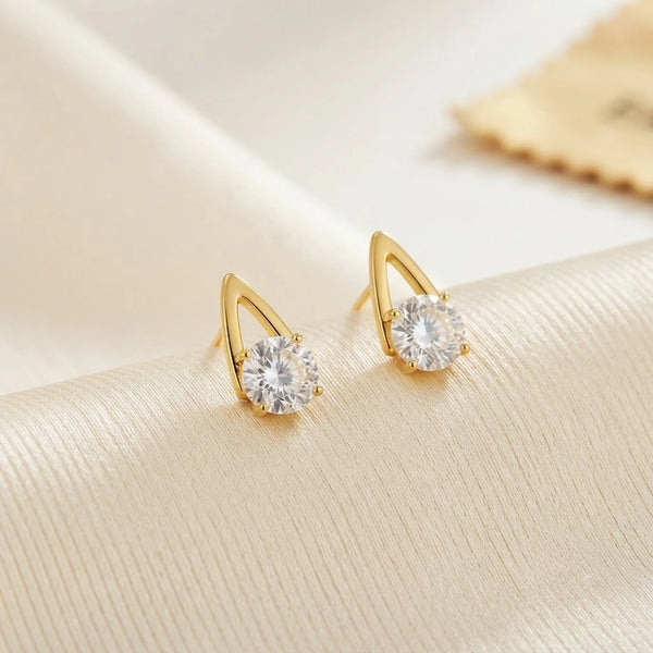 Anti tarnish gold plated solitaire stud earrings front view on silk background
