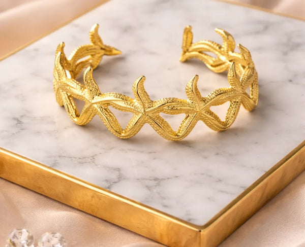 stainless steel starfish bangle side detail gold polish