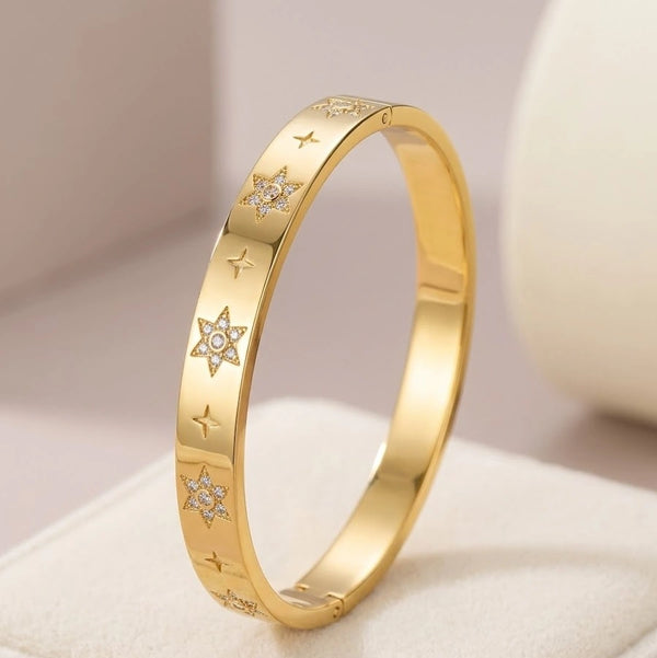 Front view of star motif anti tarnish gold plated bangle