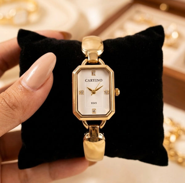 Front view of vintage rectangular anti-tarnish gold plated watch