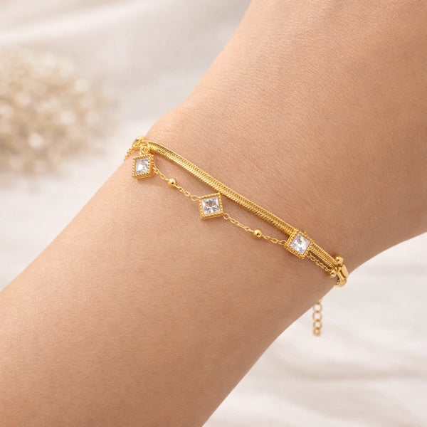 Stylish western aesthetic minimalist layered snake chain bracelet worn on wrist