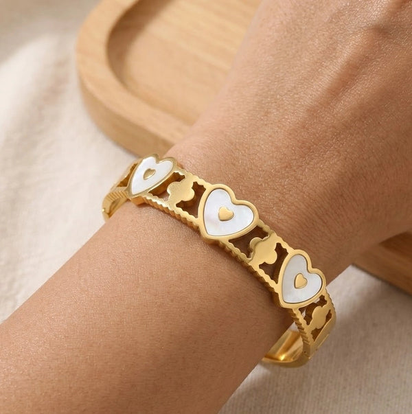Front view of white heart motif anti tarnish gold plated bracelet