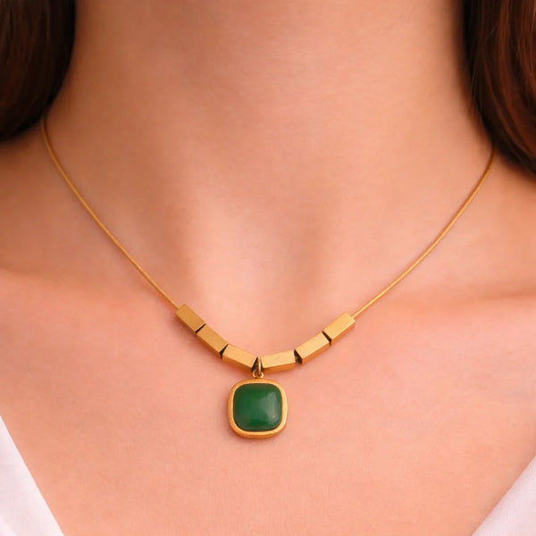 Woman wearing stylish anti tarnish green stone gold plated necklace