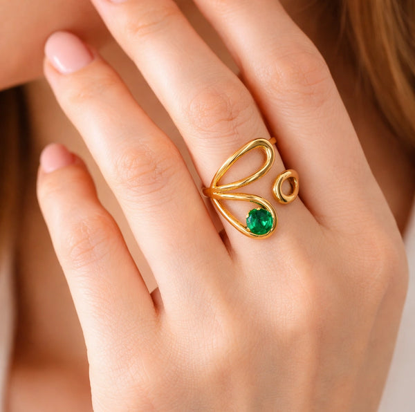 Woman wearing the emerald green statement fashion ring