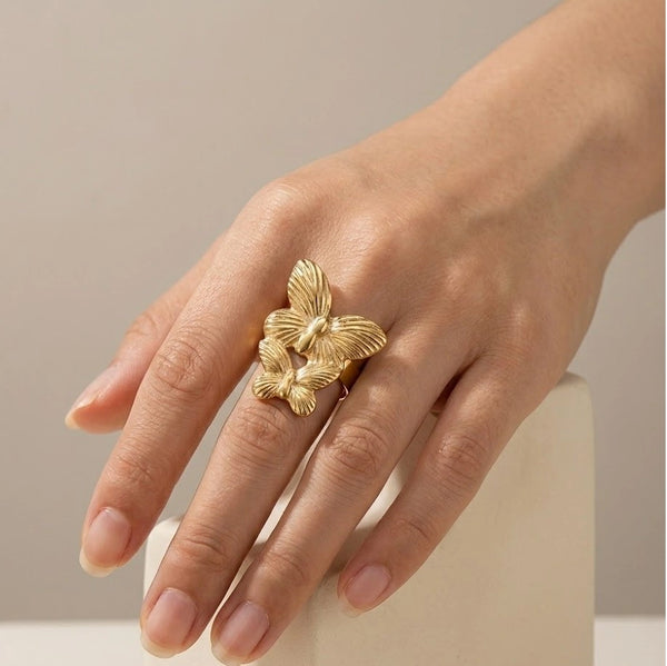 Woman wearing daily wear gold plated butterfly ring